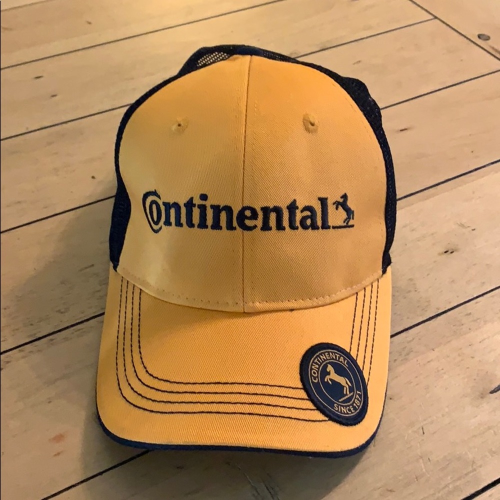 Like new continental orange and black trucker hat